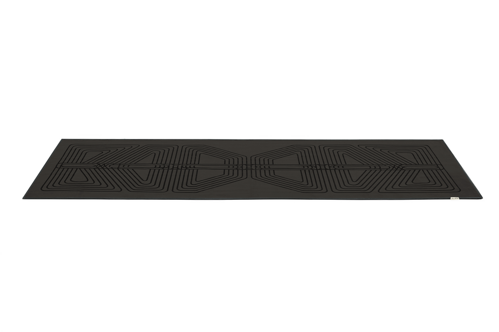 The GECKO WARRIOR – Nightfall yoga towel features a unique wet/dry grip Focus Alinement™ pattern made of tactile silicone, inspired by but not directly taken from ancient warrior cultures. It comes with a sleek black graphite base with contrasting colored stitching and is made using an eco-friendly, dye-free process.