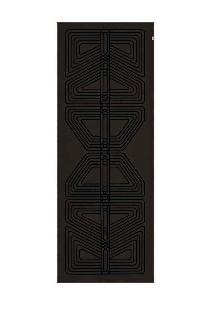 The GECKO WARRIOR – Nightfall yoga towel features a unique wet/dry grip Focus Alinement™ pattern made of tactile silicone, inspired by but not directly taken from ancient warrior cultures. It comes with a sleek black graphite base with contrasting colored stitching and is made using an eco-friendly, dye-free process.