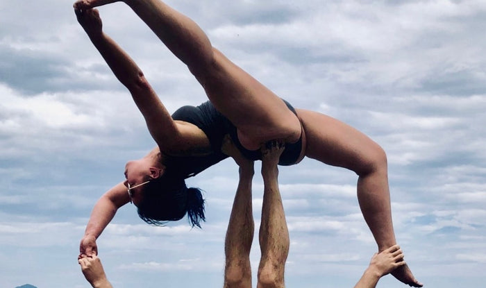 Dogs and Acroyoga Help This English Teacher Keep Her Stress In Check.